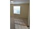 Neutral carpeted bedroom with bright natural light from a window at 20420 Carolina Cherry Ct, Tampa, FL 33647