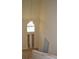 The foyer features a high ceiling with a decorative chandelier, arched window, and a craftsman-style front door at 20420 Carolina Cherry Ct, Tampa, FL 33647