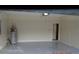 Clean garage with water heater and extra storage space at 20420 Carolina Cherry Ct, Tampa, FL 33647