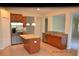Bright kitchen with stainless steel appliances and island at 20420 Carolina Cherry Ct, Tampa, FL 33647