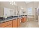 Large bathroom boasts double sinks, granite countertops, a soaking tub, and glass shower at 215 S Westland Ave # 3, Tampa, FL 33606