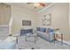 Cozy living room featuring plush seating, TV, and stylish décor, perfect for relaxation and entertaining at 215 S Westland Ave # 3, Tampa, FL 33606