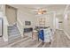 Inviting living room with stairs, stylish gray flooring, and comfortable seating arrangements at 215 S Westland Ave # 3, Tampa, FL 33606