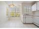 Breakfast nook with ample natural light and tile floors at 2355 Bentley Dr, Palm Harbor, FL 34684