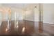 Open living room featuring vaulted ceiling, hardwood floors and natural light at 2355 Bentley Dr, Palm Harbor, FL 34684