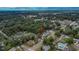 An aerial view of a home situated in a lush, green neighborhood at 2415 Devonwoode Pl, Seffner, FL 33584
