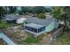 A fully screened-in patio of a single-Gathering home in a fully fenced backyard at 2415 Devonwoode Pl, Seffner, FL 33584