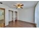 Bright bedroom with fan and closet space, offering a comfortable and organized living area at 2415 Devonwoode Pl, Seffner, FL 33584