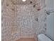 Updated shower featuring a tile surround and a shower-head with great water pressure at 2415 Devonwoode Pl, Seffner, FL 33584