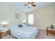 Cozy bedroom with ceiling fan, side tables, and a comfortable carpet for a peaceful escape at 2723 Garden Falls Dr, Brandon, FL 33511