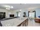 Modern kitchen featuring granite countertops, stainless steel appliances, and an eat-in area at 2723 Garden Falls Dr, Brandon, FL 33511
