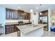 Modern kitchen with granite countertops, stainless steel appliances, and ample cabinet space at 2723 Garden Falls Dr, Brandon, FL 33511