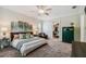Spacious bedroom with walk-in closet, ceiling fan, and stylish decor for a cozy retreat at 3109 W Granada St, Tampa, FL 33629