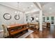 Open concept dining room with hardwood floors, open to the living room at 3109 W Granada St, Tampa, FL 33629