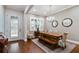 Formal dining room with hardwood floors and a glass door to the exterior at 3109 W Granada St, Tampa, FL 33629