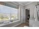 Bright bathroom features natural light, granite countertop, and modern fixtures at 3161 Satilla Loop, Odessa, FL 33556