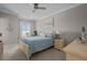 Calming bedroom with a ceiling fan, white trim and a coastal color palette at 3161 Satilla Loop, Odessa, FL 33556