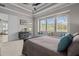 Bright bedroom featuring a window seat between three large windows with views of the outdoors at 3161 Satilla Loop, Odessa, FL 33556