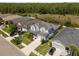 Beautiful two-story home with a well-manicured lawn and backyard backing up to wooded area at 3161 Satilla Loop, Odessa, FL 33556