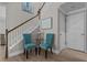 Elegant foyer with staircase, seating and stylish decor at 3161 Satilla Loop, Odessa, FL 33556