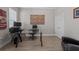 Cozy home office setup with a glass desk and neutral decor at 3161 Satilla Loop, Odessa, FL 33556
