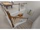 View from the top of staircase looking down to the living room at 3161 Satilla Loop, Odessa, FL 33556