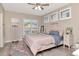 Comfortable bedroom with a ceiling fan and bright natural light at 3412 W San Juan St # B, Tampa, FL 33629