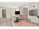 Second floor office with hardwood floors, large windows and white wooden shutters at 3412 W San Juan St # B, Tampa, FL 33629