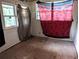 Cozy bedroom bathed in natural light, ready for renovation and your personal touch at 3706 N 36Th St, Tampa, FL 33610