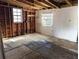 Partially renovated room, ready for renovations, featuring new windows and natural light at 3706 N 36Th St, Tampa, FL 33610