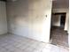 Spacious room with tile flooring, ready for complete renovation and customization at 3706 N 36Th St, Tampa, FL 33610