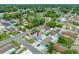 Aerial view of a residential area showcasing the property with a red arrow, indicating its location at 3927 Spence Ave, Tampa, FL 33614