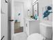 Bathroom with luxury vinyl plank flooring and a new vanity at 3927 Spence Ave, Tampa, FL 33614