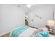 Bedroom featuring luxury vinyl plank flooring and a view into the kitchen at 3927 Spence Ave, Tampa, FL 33614