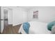 Bedroom featuring luxury vinyl plank flooring and a large window at 3927 Spence Ave, Tampa, FL 33614