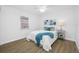 Bedroom featuring luxury vinyl plank flooring and a window with blinds at 3927 Spence Ave, Tampa, FL 33614