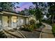 Charming single-story home with cozy front yard landscaping and inviting entrance at 39650 Us Highway 19 N # 143, Tarpon Springs, FL 34689