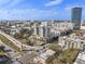 Aerial view of apartment buildings near a highway, with city buildings in the background at 400 4Th S Ave # 508, St Petersburg, FL 33701