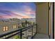 Balcony view featuring a colorful sunset sky and overlooking the surrounding neighborhood at 400 4Th S Ave # 508, St Petersburg, FL 33701