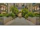 Condominium entrance with water feature and lush, mature plantings in a bright, airy setting at 400 4Th S Ave # 508, St Petersburg, FL 33701