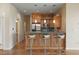 Kitchen features a breakfast bar, stainless steel appliances, and natural wood cabinets at 400 4Th S Ave # 508, St Petersburg, FL 33701