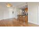 The open living area has hardwood floors, a breakfast bar and a ceiling fan at 400 4Th S Ave # 508, St Petersburg, FL 33701