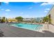 Rooftop pool with lounge chairs, umbrellas, and lush landscaping, creating a relaxing oasis at 400 4Th S Ave # 508, St Petersburg, FL 33701