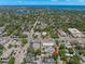 Overhead aerial view showcasing a residential area with beautiful trees, roads, and nearby businesses at 427 21St N Ave, St Petersburg, FL 33704