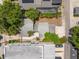 Aerial shot showcasing a backyard with a screened pool and lush landscaping in a residential area at 427 21St N Ave, St Petersburg, FL 33704