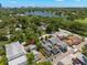 Aerial view featuring the property's proximity to a lake, green spaces, and neighborhood streets at 427 21St N Ave, St Petersburg, FL 33704