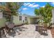 Inviting backyard with a barbecue, patio area, and tropical landscaping on a sunny day at 427 21St N Ave, St Petersburg, FL 33704