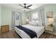 Inviting bedroom with a ceiling fan, natural light, and neutral decor at 427 21St N Ave, St Petersburg, FL 33704