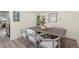Bright dining area featuring modern furnishings and an adjacent kitchen at 427 21St N Ave, St Petersburg, FL 33704