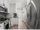 Bright kitchen with stainless appliances, marble counters, and ample white cabinetry at 427 21St N Ave, St Petersburg, FL 33704